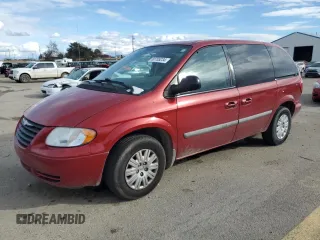 2007 Chrysler Town & Country SWB with VIN 1A4GJ45R37B210580, listed as a Copart auction lot 80785234 with 120,719 mi miles and Salvage Title. Bid and sale history available at carsss.com. Image 1.