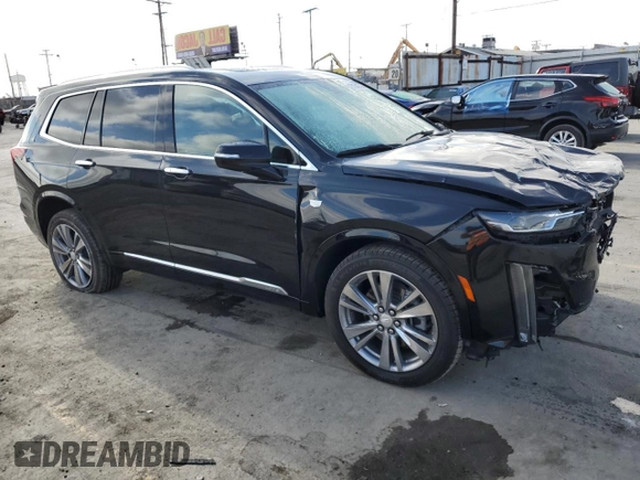 2023 Cadillac XT6 FWD Premium Luxury with VIN 1GYKPCRS9PZ117215, listed as a Copart auction lot 71242714 with 29,162 mi miles and Salvage Title. Bid and sale history available at carsss.com. Image 4.