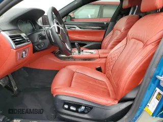 2019 BMW 7 Series 750i z VIN WBA7F0C51KGM25707, wystawiony jako Copart lot #61950495 z przebiegiem 56 768 mil mil oraz Nie do naprawy • Non repairable. Historia ofert i sprzedaży dostępna na DreamBid. Obrazek 7.