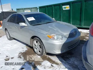 2002 Toyota Camry LE z VIN 4T1BE32K22U007923, wystawiony jako IAAI lot #41605872 z przebiegiem 209 088 mil mil oraz . Historia ofert i sprzedaży dostępna na DreamBid. Obrazek 1.