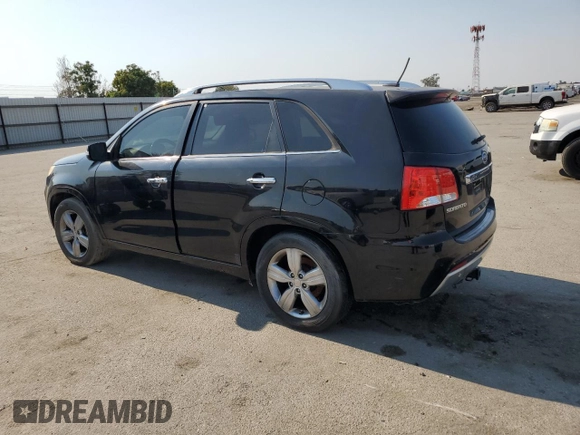 2012 Kia Sorento SX with VIN 5XYKW4A20CG297980, listed as a Copart auction lot 64844745 with 171,239 mi miles and Clean title. Bid and sale history available at DreamBid. Image 2.