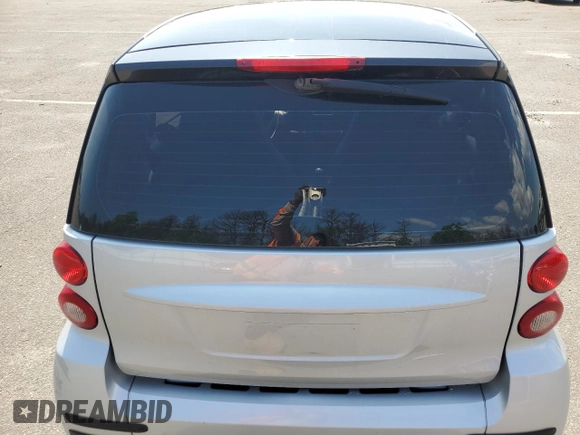2011 Smart fortwo Pure with VIN WMEEJ3BA6BK449704, listed as a Copart auction lot 69454434 with 23,581 mi miles and Clean title. Bid and sale history available at DreamBid. Image 10.