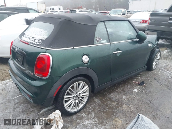 2017 MINI Convertible Cooper S z VIN WMWWG9C38H3C81071, wystawiony jako IAAI lot #41522738 z przebiegiem 59 040 mil mil oraz . Historia ofert i sprzedaży dostępna na DreamBid. Obrazek 4.