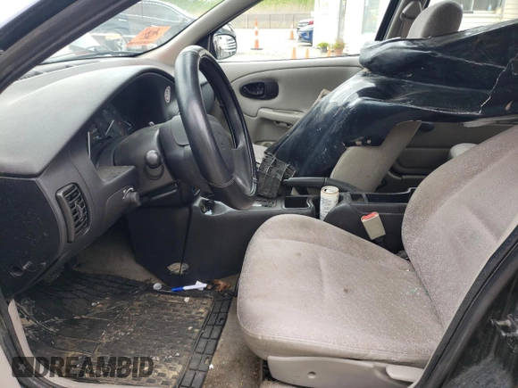 2002 Saturn SL z VIN 1G8ZH52842Z201392, wystawiony jako Copart lot #56595105 z przebiegiem Nie podano mil oraz Szkoda całkowita • Salvage title. Historia ofert i sprzedaży dostępna na DreamBid. Obrazek 7.