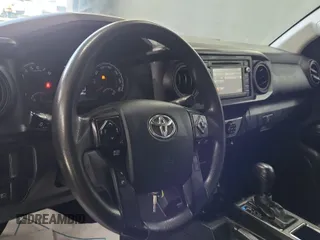2019 Toyota Tacoma SR with VIN 5TFRX5GN1KX143485, listed as a IAAI auction lot 42763045 with 90,847 mi miles and . Bid and sale history available at DreamBid. Image 41.
