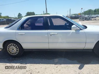 1993 Acura Legend L with VIN JH4KA7668PC025178, listed as a IAAI auction lot 41990390 with 187,755 mi miles and . Bid and sale history available at DreamBid. Image 14.