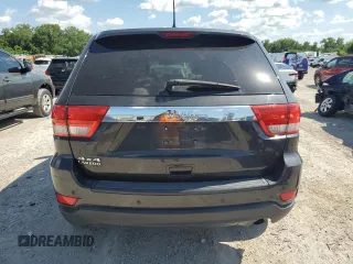 2011 Jeep Grand Cherokee Laredo z VIN 1J4RR4GG9BC614502, wystawiony jako Copart lot #64179275 z przebiegiem 189 284 mil mil oraz Czysty tytuł • Clean title. Historia ofert i sprzedaży dostępna na DreamBid. Obrazek 6.