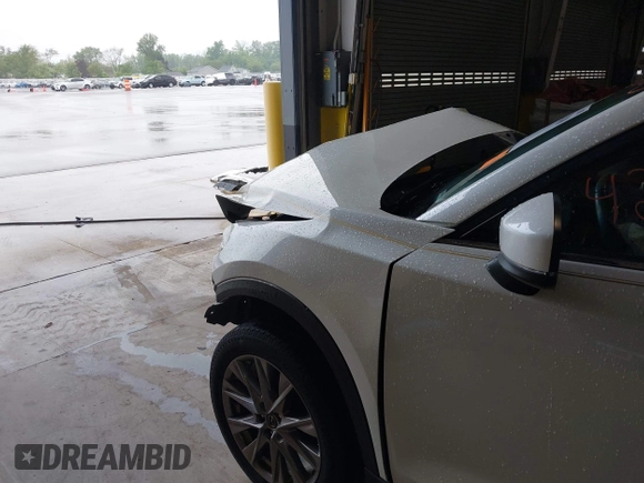 2020 Mazda CX-5 Grand Touring with VIN JM3KFADMXL0742038, listed as a IAAI auction lot 42292400 with 68,339 mi miles and . Bid and sale history available at DreamBid. Image 20.
