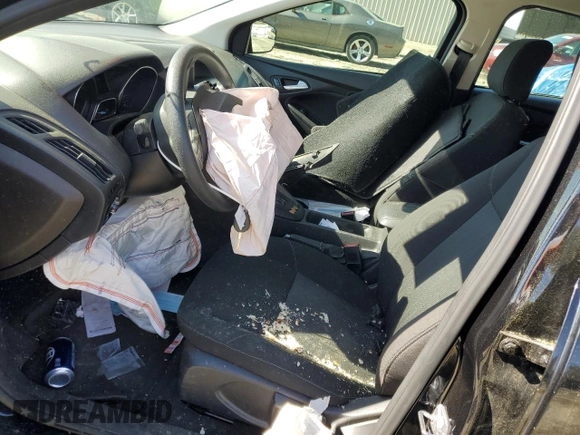 2015 Ford Focus SE with VIN 1FADP3F26FL228606, listed as a Copart auction lot 52525445 with 37,477 mi miles and Salvage Title. Bid and sale history available at DreamBid. Image 7.