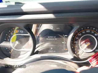 2024 Jeep Wrangler Rubicon with VIN 1C4PJXFG6RW291185, listed as a IAAI auction lot 41773050 with 12,400 mi miles and . Bid and sale history available at DreamBid. Image 7.