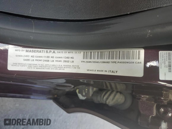 2018 Maserati Ghibli with VIN ZAM57XSA0J1286682, listed as a Copart auction lot 65457315 with 50,169 mi miles and Salvage title. Bid and sale history available at DreamBid. Image 12.