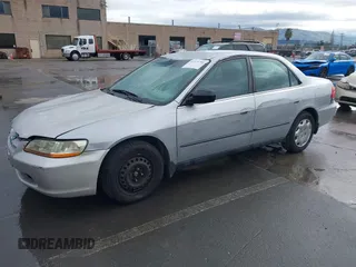 1999 Honda Accord LX z VIN 1HGCG5645XA023392, wystawiony jako IAAI lot #41525751 z przebiegiem 214 850 mil mil oraz . Historia ofert i sprzedaży dostępna na DreamBid. Obrazek 17.