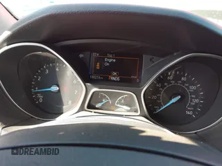 2016 Ford Focus SE with VIN 1FADP3F2XGL256037, listed as a IAAI auction lot 42047789 with 130,274 mi miles. Bid and sale history available at carsss.com. Image 7.