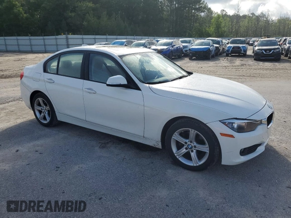 2014 BMW 3 Series 320i xDrive with VIN WBA3C3G52ENS67719, listed as a Copart auction lot 56863505 with 90,490 mi miles and Salvage title. Bid and sale history available at DreamBid. Image 4.