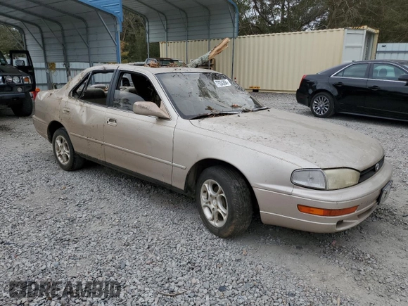 1993 Toyota Camry LE with VIN 4T1SK12E5PU316445, listed as a Copart auction lot 77534394 with 175,506 mi miles and Salvage Title. Bid and sale history available at carsss.com. Image 4.