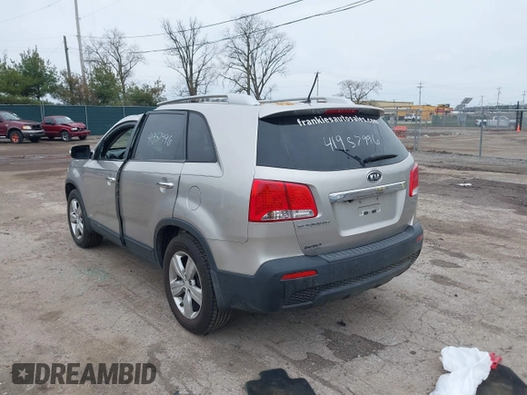 2013 Kia Sorento EX with VIN 5XYKUCA67DG380083, listed as a IAAI auction lot 41957996 with 73,598 mi miles and . Bid and sale history available at DreamBid. Image 3.