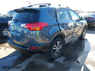2014 Toyota RAV4 LE with VIN JTMZFREVXED029505, listed as a IAAI auction lot 40916384 with 142,408 mi miles. Bid and sale history available at carsss.com. Image 4.