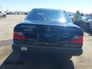 1993 Mercedes-Benz 400 with VIN WDBEA34E6PB942402, listed as a IAAI auction lot 41855899 with 124,065 mi miles. Bid and sale history available at carsss.com. Image 16.