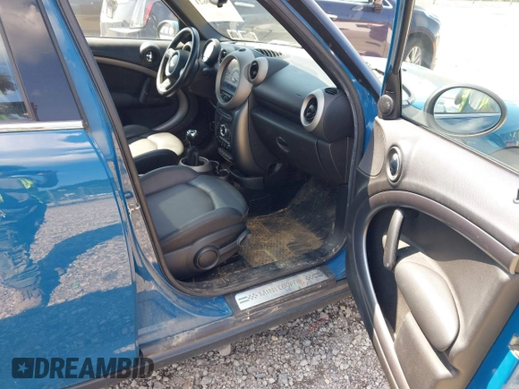 2011 MINI Countryman S with VIN WMWZC5C57BWM11279, listed as a IAAI auction lot 42649621 with 100,000 mi miles and . Bid and sale history available at DreamBid. Image 5.