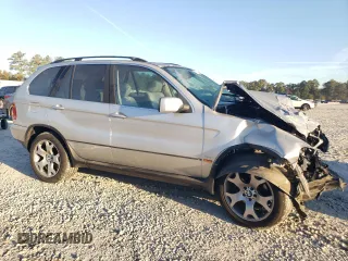 2000 BMW X5 4.4i with VIN WBAFB3355YLH05755, listed as a Copart auction lot 77136744 with 0 mi miles and Salvage Title. Bid and sale history available at carsss.com. Image 4.