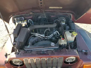 2002 Jeep Wrangler Sahara with VIN 1J4FA59S22P704603, listed as a Copart auction lot 77554334 with 99,758 mi miles and Salvage Title. Bid and sale history available at carsss.com. Image 12.