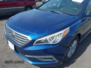 2015 Hyundai Sonata SE z VIN 5NPE24AF7FH158728, wystawiony jako IAAI lot #41841372 z przebiegiem 128 948 mil mil oraz . Historia ofert i sprzedaży dostępna na DreamBid. Obrazek 6.