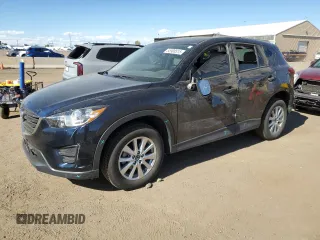 2016 Mazda CX-5 Sport z VIN JM3KE4BY4G0734582, wystawiony jako Copart lot #55908515 z przebiegiem 52 323 mil mil oraz Szkoda całkowita • Salvage title. Historia ofert i sprzedaży dostępna na DreamBid. Obrazek 1.