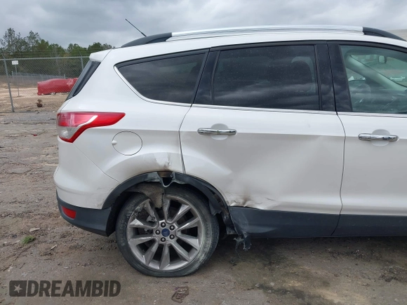 2016 Ford Escape SE with VIN 1FMCU0GX0GUA95789, listed as a IAAI auction lot 41829818 with 84,431 mi miles. Bid and sale history available at carsss.com. Image 6.