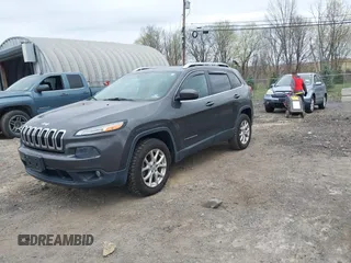 2014 Jeep Cherokee Latitude with VIN 1C4PJMCS5EW201459, listed as a IAAI auction lot 42092653 with 147,430 mi miles. Bid and sale history available at carsss.com. Image 17.