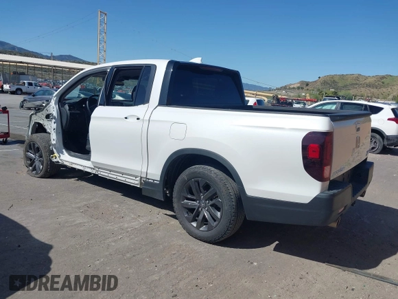 2023 Honda Ridgeline Sport z VIN 5FPYK3F13PB060341, wystawiony jako IAAI lot #41955592 z przebiegiem 27 927 mil mil oraz . Historia ofert i sprzedaży dostępna na DreamBid. Obrazek 3.