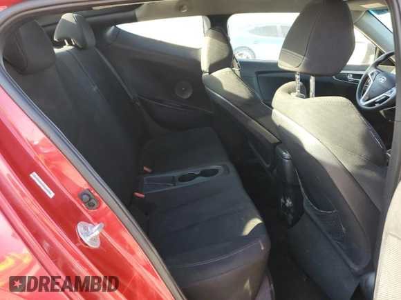 2014 Hyundai Veloster z VIN KMHTC6AD8EU213234, wystawiony jako Copart lot #53297535 z przebiegiem 131 769 mil mil oraz Szkoda całkowita • Salvage title. Historia ofert i sprzedaży dostępna na DreamBid. Obrazek 10.