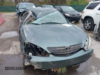 2002 Toyota Camry XLE z VIN 4T1BF32K02U522335, wystawiony jako IAAI lot #42037459 z przebiegiem 214 832 mil mil oraz . Historia ofert i sprzedaży dostępna na DreamBid. Obrazek 6.