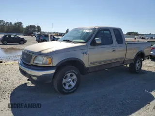 1999 Ford F-150 XL with VIN 1FTRX18LXXNA59898, listed as a Copart auction lot 49326055 with 0 mi miles and Salvage Title. Bid and sale history available at carsss.com. Image 1.