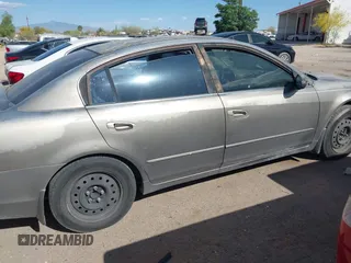 2003 Nissan Altima S with VIN 1N4AL11D73C163112, listed as a IAAI auction lot 42084672 with 184,140 mi miles and . Bid and sale history available at DreamBid. Image 14.