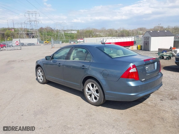 2012 Ford Fusion SE with VIN 3FAHP0HAXCR228318, listed as a IAAI auction lot 42048711 with 76,700 mi miles. Bid and sale history available at carsss.com. Image 3.