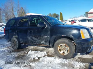 2007 GMC Yukon SLT with VIN 1GKFK13077R123021, listed as a IAAI auction lot 41603180 with 247,945 mi miles. Bid and sale history available at carsss.com. Image 13.