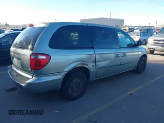 2003 Dodge Grand Caravan with VIN 2D8GP44383R156904, listed as a IAAI auction lot 41858820 with Not Provided miles and . Bid and sale history available at DreamBid. Image 4.