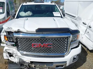 2015 GMC Sierra 2500HD Denali z VIN 1GT120E85FF641373, wystawiony jako IAAI lot #41791280 z przebiegiem 281 137 mil mil oraz . Historia ofert i sprzedaży dostępna na DreamBid. Obrazek 20.