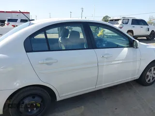 2010 Hyundai Accent GLS with VIN KMHCN4AC7AU473527, listed as a IAAI auction lot 41965592 with 104,506 mi miles. Bid and sale history available at carsss.com. Image 13.