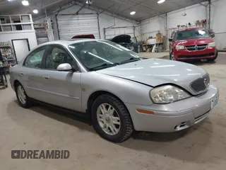 2004 Mercury Sable LS Premium with VIN 1MEFM55S04A628323, listed as a IAAI auction lot 41888634 with 70,725 mi miles. Bid and sale history available at carsss.com. Image 1.