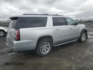 2015 GMC Yukon XL SLT with VIN 1GKS2HKC8FR616031, listed as a Copart auction lot 48740785 with 128,467 mi miles and Salvage Title. Bid and sale history available at carsss.com. Image 3.