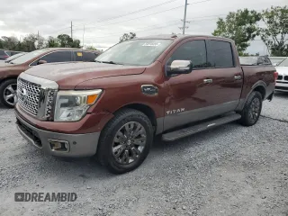 2017 Nissan Titan Platinum Reserve z VIN 1N6AA1E61HN521356, wystawiony jako Copart lot #59310455 z przebiegiem 182 476 mil mil oraz Czysty tytuł • Clean title. Historia ofert i sprzedaży dostępna na DreamBid. Obrazek 1.