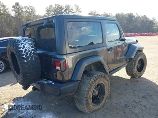 2021 Jeep Wrangler Sport S with VIN 1C4GJXAGXMW863259, listed as a IAAI auction lot 41399671 with 41,270 mi miles and . Bid and sale history available at DreamBid. Image 4.