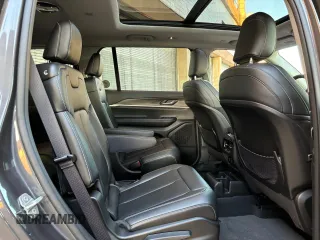 2023 Jeep Grand Cherokee Limited z VIN 1C4RJKBG4P8840711, wystawiony jako Copart lot #56185315 z przebiegiem 8 076 mil mil oraz Szkoda całkowita • Salvage title. Historia ofert i sprzedaży dostępna na DreamBid. Obrazek 9.