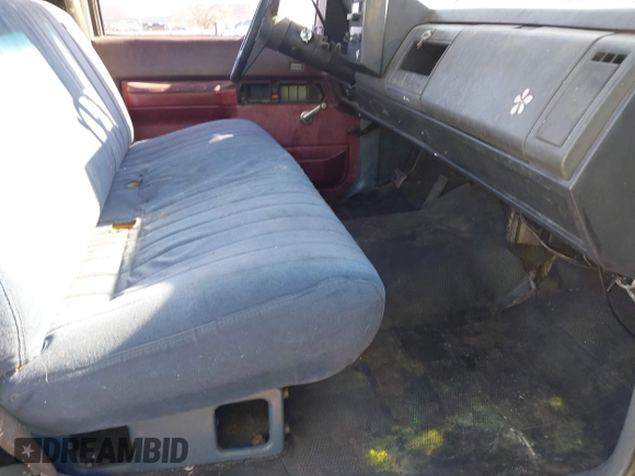 1989 GMC Sierra 1500 with VIN 1GTGC24K2KE504519, listed as a IAAI auction lot 41739839 with 306,714 mi miles and . Bid and sale history available at DreamBid. Image 5.