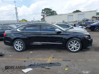 2014 Chevrolet Impala LTZ with VIN 1G1155S32EU155880, listed as a IAAI auction lot 41964572 with 184,992 mi miles and . Bid and sale history available at DreamBid. Image 13.
