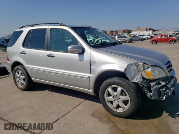 2002 Mercedes-Benz M-Class with VIN 4JGAB75E12A308993, listed as a Copart auction lot 48964095 with 75,340 mi miles and Salvage Title. Bid and sale history available at carsss.com. Image 4.