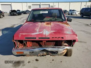 1989 Nissan Hardbody z VIN 1N6ND11S9KC399764, wystawiony jako Copart lot #87067574 z przebiegiem 87 990 mil mil oraz Szkody całkowita. Historia ofert i sprzedaży dostępna na DreamBid. Obrazek 5.