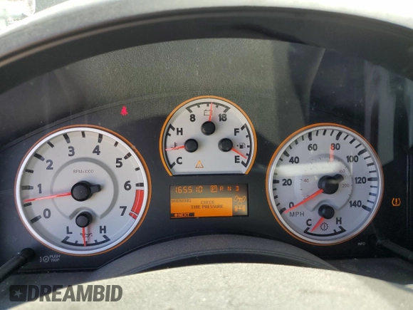 2015 Nissan Titan Pro-4X with VIN 1N6BA0EC1FN507491, listed as a Copart auction lot 51240915 with 165,510 mi miles and Salvage title. Bid and sale history available at DreamBid. Image 9.