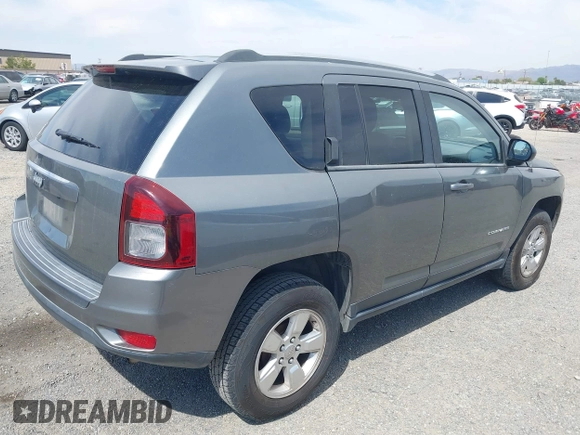 2014 Jeep Compass Sport with VIN 1C4NJCBA0ED524145, listed as a IAAI auction lot 42171212 with 187,257 mi miles. Bid and sale history available at carsss.com. Image 4.